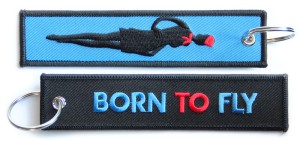 Czarny haftowany brelok BORN TO FLY