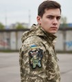 Żubr Ukraina na ramieniu kurtki wojskowej