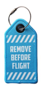Zawieszka bagażowa do walizki Remove Before Flight identyfikator